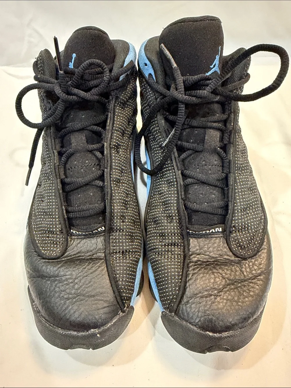 Jordan Men's Black and University Blue Retro Sneakers
